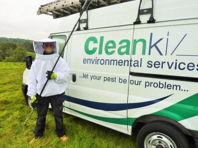 Technician in wasp personal protective equipment (PPE)